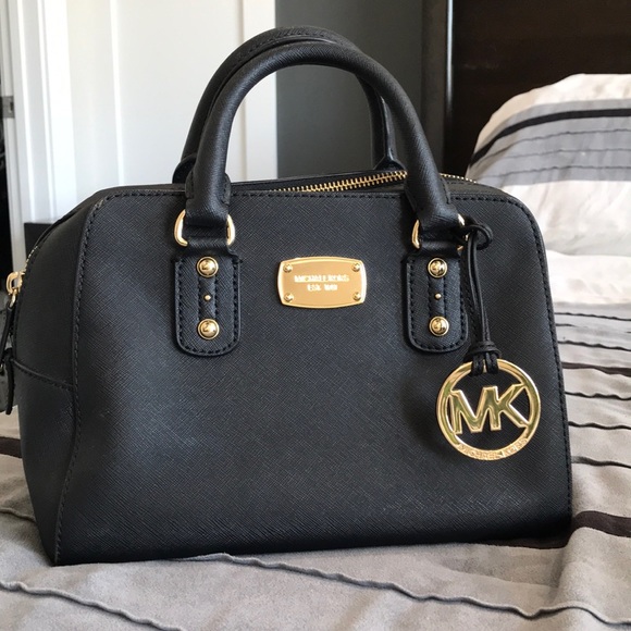 Michael Kors Black and Gold Purse. - Picture 1 of 1